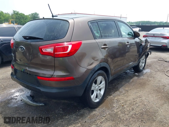 2012 Kia Sportage LX with VIN KNDPB3A20C7290990, listed as a IAAI auction lot 42264420 with 87,994 mi miles and . Bid and sale history available at DreamBid. Image 4.