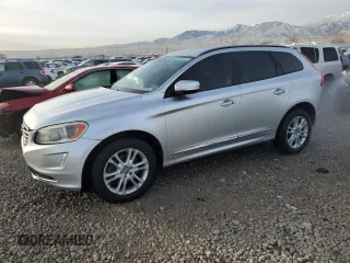 2015 Volvo XC60 T5 Drive-E with VIN YV440MDJ6F2681156, listed as a Copart auction lot 83690094 with 153,459 mi miles and Salvage Title. Bid and sale history available at carsss.com. Image 1.