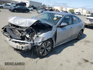 2016 Honda Civic EX-L with VIN 2HGFC1F79GH638668, listed as a Copart auction lot 58792165 with 214,768 mi miles and Salvage title. Bid and sale history available at DreamBid. Image 1.