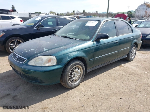 1999 Honda Civic VP with VIN 2HGEJ6619XH509582, listed as a IAAI auction lot 41774443 with 231,357 mi miles. Bid and sale history available at carsss.com. Image 2.