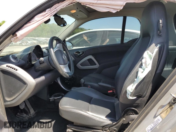 2013 Smart fortwo Pure с VIN WMEEJ3BA9DK618746, выставлен на аукционе Copart как лот 56752885 с пробегом 80 293 миль миль и Списание • Salvage title. История ставок и продаж доступна на DreamBid. Изображение 7.