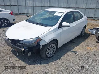 2018 Toyota Corolla L with VIN 2T1BURHE3JC988786, listed as a IAAI auction lot 42597734 with 88,016 mi miles and . Bid and sale history available at DreamBid. Image 2.