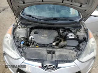 2013 Hyundai Veloster w/Gray Int z VIN KMHTC6AD3DU135296, wystawiony jako Copart lot #59778985 z przebiegiem 125 134 mil mil oraz Czysty tytuł • Clean title. Historia ofert i sprzedaży dostępna na DreamBid. Obrazek 11.