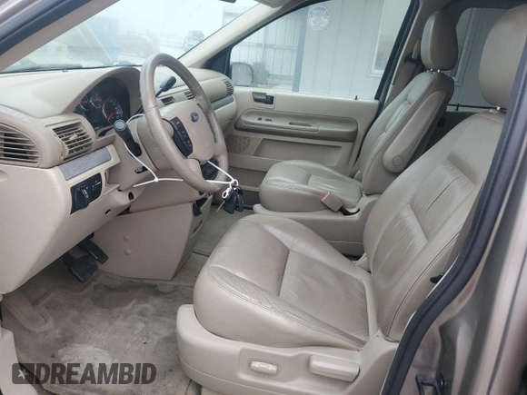 2005 Ford Freestar z VIN 2FMZA57215BA15987, wystawiony jako Copart lot #66308294 z przebiegiem 95 515 mil mil oraz Szkoda całkowita • Salvage title. Historia ofert i sprzedaży dostępna na DreamBid. Obrazek 7.