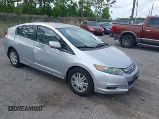 2010 Honda Insight LX with VIN JHMZE2H52AS038807, listed as a IAAI auction lot 42120846 with 242,816 mi miles and . Bid and sale history available at DreamBid. Image 1.