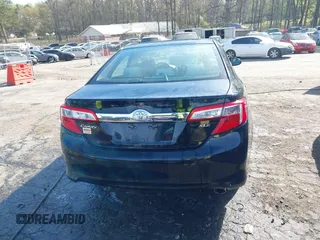 2013 Toyota Camry L with VIN 4T1BF1FK1DU666784, listed as a IAAI auction lot 41869487 with 99,396 mi miles. Bid and sale history available at carsss.com. Image 16.