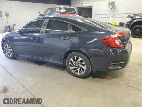 2018 Honda Civic EX с VIN 19XFC2F77JE040070, выставлен на аукционе Copart как лот 56895195 с пробегом 39 746 миль миль и Списание • Salvage title. История ставок и продаж доступна на DreamBid. Изображение 2.