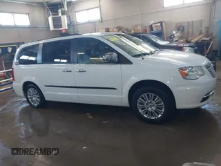 2015 Chrysler Town & Country Touring-L with VIN 2C4RC1CG9FR573653, listed as a IAAI auction lot 41839012 with 116,248 mi miles. Bid and sale history available at carsss.com. Image 13.