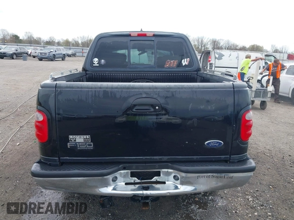 2002 Ford F-150 XLT with VIN 1FTRW08L32KD90202, listed as a IAAI auction lot 41850546 with 256,807 mi miles. Bid and sale history available at carsss.com. Image 16.