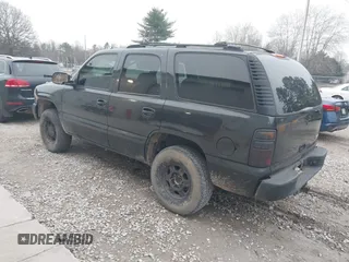 2003 GMC Yukon SLT with VIN 1GKEC13ZX3R181111, listed as a IAAI auction lot 41496338 with 307,996 mi miles. Bid and sale history available at carsss.com. Image 3.