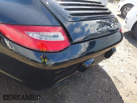 2009 Porsche 911 Carrera S with VIN WP0AB29979S721350, listed as a IAAI auction lot 39058934 with 44,352 mi miles. Bid and sale history available at carsss.com. Image 17.