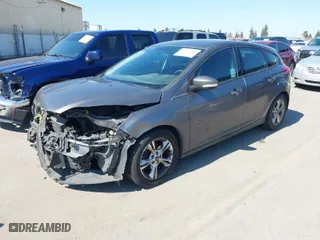 2014 Ford Focus SE with VIN 1FADP3K21EL123993, listed as a IAAI auction lot 41869253 with 83,525 mi miles. Bid and sale history available at carsss.com. Image 2.