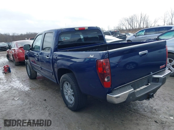 2012 GMC Canyon SLE1 with VIN 1GTH6MFEXC8122298, listed as a IAAI auction lot 41728684 with 185,147 mi miles. Bid and sale history available at carsss.com. Image 3.