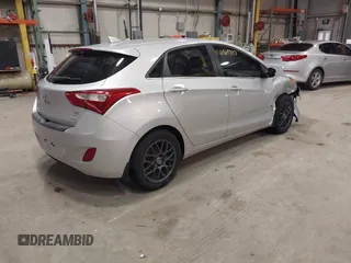 2013 Hyundai Elantra GT with VIN KMHD35LE3DU151891, listed as a IAAI auction lot 41869397 with 84,692 mi miles. Bid and sale history available at carsss.com. Image 4.