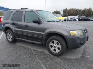 2006 Ford Escape XLT with VIN 1FMCU03196KA07611, listed as a IAAI auction lot 41794117 with 156,804 mi miles. Bid and sale history available at carsss.com. Image 1.