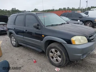 2002 Mazda Tribute LX with VIN 4F2YU08192KM35689, listed as a IAAI auction lot 41356009 with 217,866 mi miles. Bid and sale history available at carsss.com. Image 1.