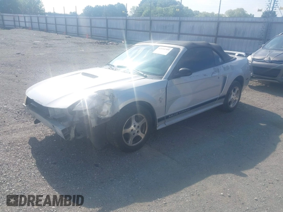 2002 Ford Mustang Deluxe with VIN 1FAFP44432F205991, listed as a IAAI auction lot 42144709 with 138,119 mi miles and . Bid and sale history available at DreamBid. Image 2.