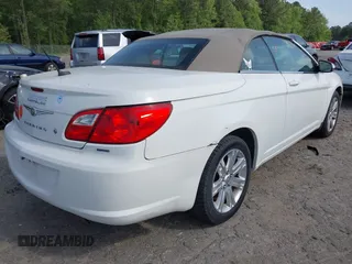 2010 Chrysler Sebring Touring with VIN 1C3BC5ED5AN105022, listed as a IAAI auction lot 42048657 with 188,920 mi miles and . Bid and sale history available at DreamBid. Image 4.