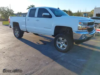 2017 Chevrolet Silverado 1500 LT with VIN 1GCVKREC7HZ216507, listed as a IAAI auction lot 41828407 with 138,294 mi miles. Bid and sale history available at carsss.com. Image 1.