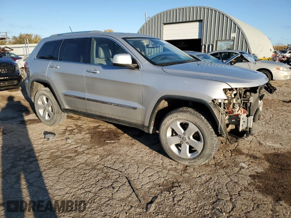 2012 Jeep Grand Cherokee Laredo with VIN 1C4RJEAG1CC354819, listed as a Copart auction lot 78532794 with 142,474 mi miles and Salvage Title. Bid and sale history available at carsss.com. Image 4.