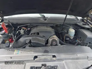 2010 Chevrolet Suburban LT with VIN 1GNUCJE06AR138587, listed as a IAAI auction lot 42145484 with 283,318 mi miles and . Bid and sale history available at DreamBid. Image 10.