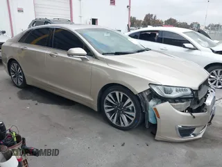2017 Lincoln MKZ Hybrid Reserve z VIN 3LN6L5MU3HR609831, wystawiony jako IAAI lot #42118573 z przebiegiem 64 246 mil mil oraz . Historia ofert i sprzedaży dostępna na DreamBid. Obrazek 1.