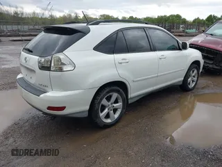2007 Lexus RX 350 with VIN 2T2GK31U17C020054, listed as a IAAI auction lot 42014039 with 162,634 mi miles. Bid and sale history available at carsss.com. Image 4.