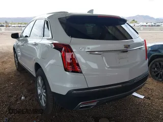 2021 Cadillac XT5 FWD Premium Luxury with VIN 1GYKNCRS5MZ224957, listed as a IAAI auction lot 41794648 with 28,540 mi miles and . Bid and sale history available at carsss.com. Image 3.
