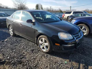 2009 Volkswagen Jetta z VIN 3VWHZ71K59M088780, wystawiony jako Copart lot #87115414 z przebiegiem 88 197 mil mil oraz Czysty tytuł • Clean title. Historia ofert i sprzedaży dostępna na DreamBid. Obrazek 4.