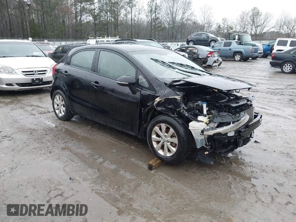 2012 Kia Rio EX with VIN KNADN5A39C6013756, listed as a IAAI auction lot 41560330 with 157,365 mi miles. Bid and sale history available at carsss.com. Image 1.