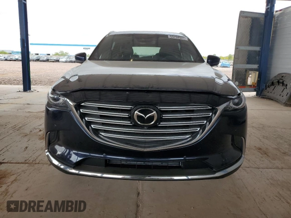 2021 Mazda CX-9 Carbon Edition z VIN JM3TCADY3M0513086, wystawiony jako Copart lot #53734925 z przebiegiem 92 744 mil mil oraz Szkoda całkowita • Salvage title. Historia ofert i sprzedaży dostępna na DreamBid. Obrazek 5.