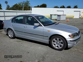 2003 BMW 3 Series 325i with VIN WBAEV33423KL85476, listed as a Copart auction lot 62429495 with 153,960 mi miles and Clean title. Bid and sale history available at DreamBid. Image 4.