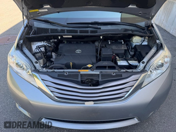 2015 Toyota Sienna Limited z VIN 5TDDK3DC8FS124511, wystawiony jako Copart lot #62570905 z przebiegiem 188 920 mil mil oraz Czysty tytuł • Clean title. Historia ofert i sprzedaży dostępna na DreamBid. Obrazek 7.