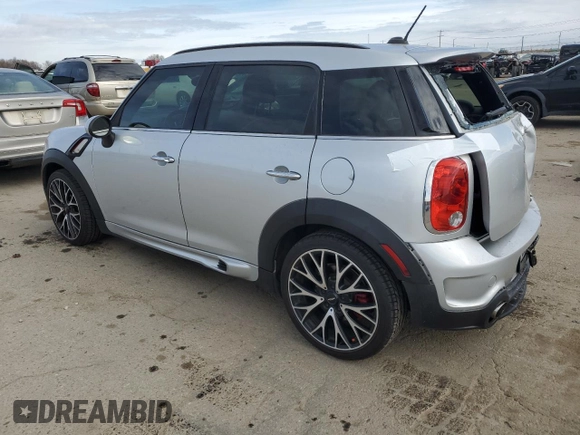 2016 MINI Countryman John Cooper Works with VIN WMWXD1C52GWT97652, listed as a Copart auction lot 49282345 with 51,983 mi miles and Salvage Title. Bid and sale history available at DreamBid. Image 2.