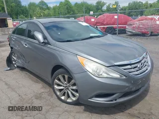 2012 Hyundai Sonata Limited z VIN 5NPEC4AB3CH336558, wystawiony jako IAAI lot #42261628 z przebiegiem 129 590 mil mil oraz . Historia ofert i sprzedaży dostępna na DreamBid. Obrazek 1.