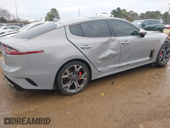 2018 Kia Stinger GT2 with VIN KNAE55LC7J6017223, listed as a IAAI auction lot 41356220 with 102,874 mi miles. Bid and sale history available at carsss.com. Image 4.
