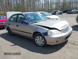 2000 Honda Civic LX with VIN 1HGEJ6673YL058884, listed as a IAAI auction lot 42038501 with 190,169 mi miles. Bid and sale history available at carsss.com. Image 1.