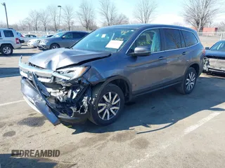 2021 Honda Pilot EX-L with VIN 5FNYF6H54MB028203, listed as a IAAI auction lot 41641116 with 46,755 mi miles and . Bid and sale history available at DreamBid. Image 17.