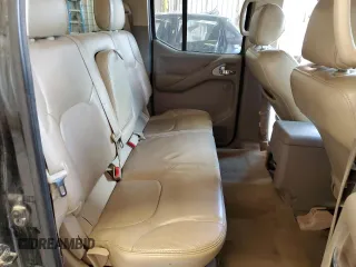 2009 Nissan Frontier LE with VIN 1N6AD09U79C409698, listed as a Copart auction lot 55843545 with 230,334 mi miles and Salvage title. Bid and sale history available at DreamBid. Image 10.