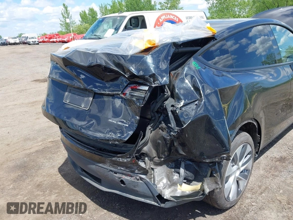 2023 Tesla Model Y Long Range with VIN 7SAYGDEE0PA183891, listed as a IAAI auction lot 42205573 with 41,273 mi miles and . Bid and sale history available at DreamBid. Image 21.