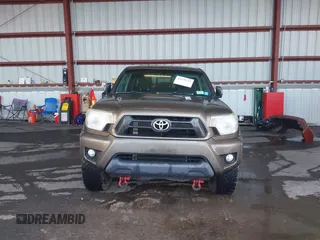 2014 Toyota Tacoma with VIN 3TMMU4FN4EM072128, listed as a IAAI auction lot 42479725 with 287,877 mi miles and . Bid and sale history available at DreamBid. Image 12.