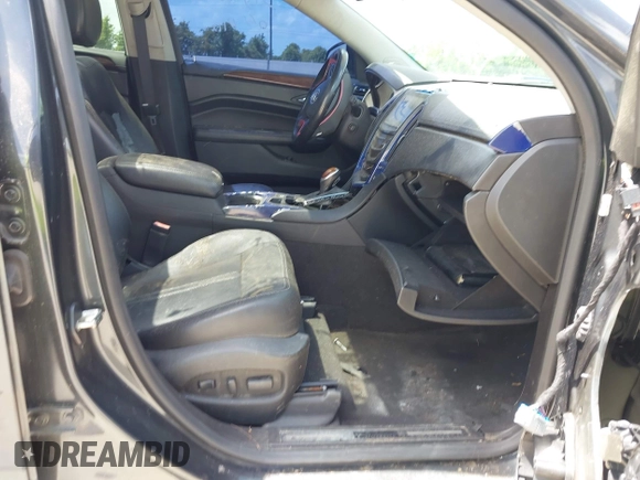 2015 Cadillac SRX Performance Collection with VIN 3GYFNCE31FS605298, listed as a IAAI auction lot 42859993 with 99,192 mi miles and . Bid and sale history available at DreamBid. Image 5.