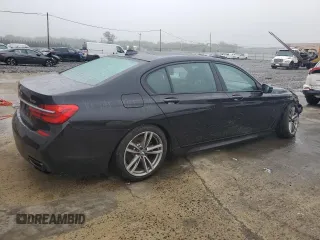 2019 BMW 7 Series 740i xDrive z VIN WBA7E4C52KGV28841, wystawiony jako Copart lot #56567375 z przebiegiem 162 220 mil mil oraz Szkody całkowita. Historia ofert i sprzedaży dostępna na DreamBid. Obrazek 3.