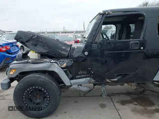 2004 Jeep Wrangler Sport with VIN 1J4FA49S64P794559, listed as a IAAI auction lot 41644201 with 107,445 mi miles. Bid and sale history available at carsss.com. Image 19.