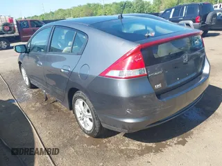 2010 Honda Insight EX with VIN JHMZE2H72AS021555, listed as a IAAI auction lot 42129289 with 172,829 mi miles and . Bid and sale history available at DreamBid. Image 3.