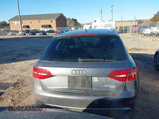 2014 Audi allroad Premium with VIN WA1TFAFL2EA068850, listed as a IAAI auction lot 41640053 with 168,660 mi miles. Bid and sale history available at carsss.com. Image 16.