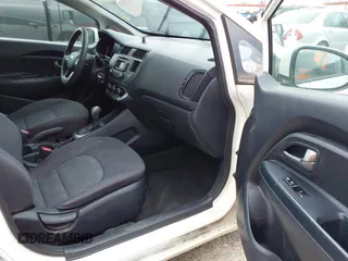 2014 Kia Rio LX with VIN KNADM4A3XE6384733, listed as a IAAI auction lot 42196921 with 153,084 mi miles and . Bid and sale history available at DreamBid. Image 5.