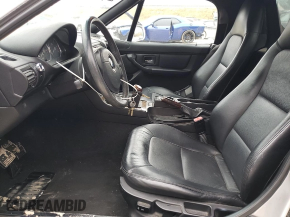 2000 BMW Z3 2.5L with VIN WBACH9349YLF91237, listed as a Copart auction lot 84605174 with 69,997 mi miles and Salvage Title. Bid and sale history available at carsss.com. Image 7.
