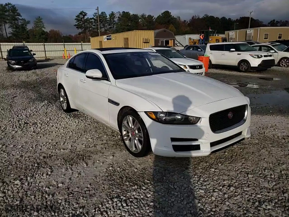 2019 Jaguar XE 25t with VIN SAJAR4FX6KCP52410, listed as a Copart auction lot 82199484 with 89,027 mi miles and Salvage Title. Bid and sale history available at carsss.com. Image 13.