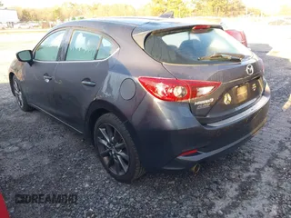 2018 Mazda 3 Touring with VIN 3MZBN1L32JM235162, listed as a IAAI auction lot 41596278 with 144,784 mi miles and . Bid and sale history available at DreamBid. Image 3.